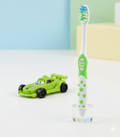 DORCO Children’s Soft Toothbrush with Fun Toy & Protective Case – Gentle Care for Kids’ Teeth & Gums (Random Design)
