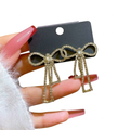 Pqt 985 Touch Of Glamour To Your Look With These Bow Shape Zircon Korean Earrings Color Golden