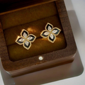 Black And Gold Floral Earrings Sparkling Four Leaf Studs With Cubic Zirconia Pjt 991